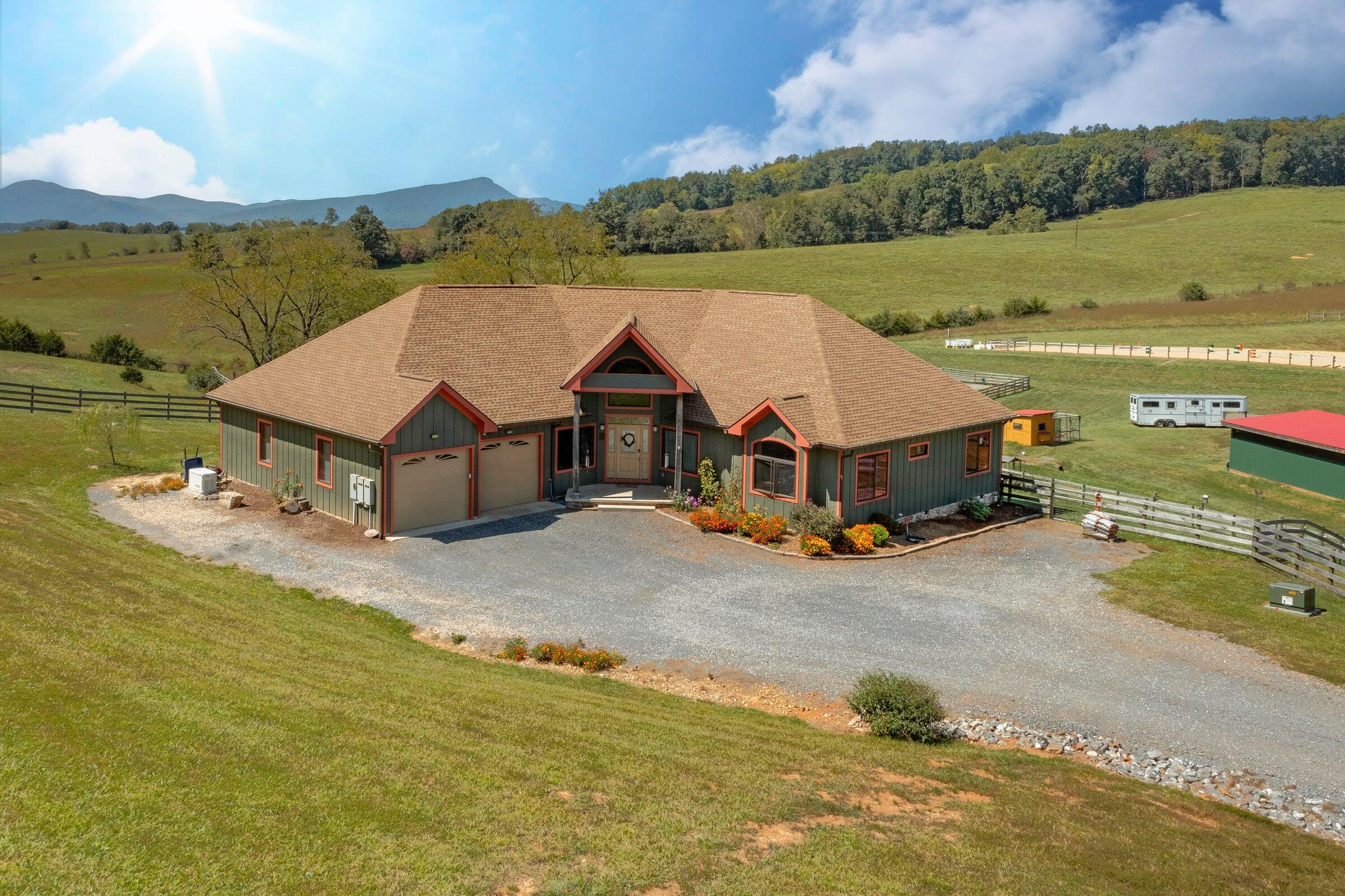 747 New Providence Road Raphine, VA 24472 - Photo 12 of 46 an aerial view of a house with big yard and large tree