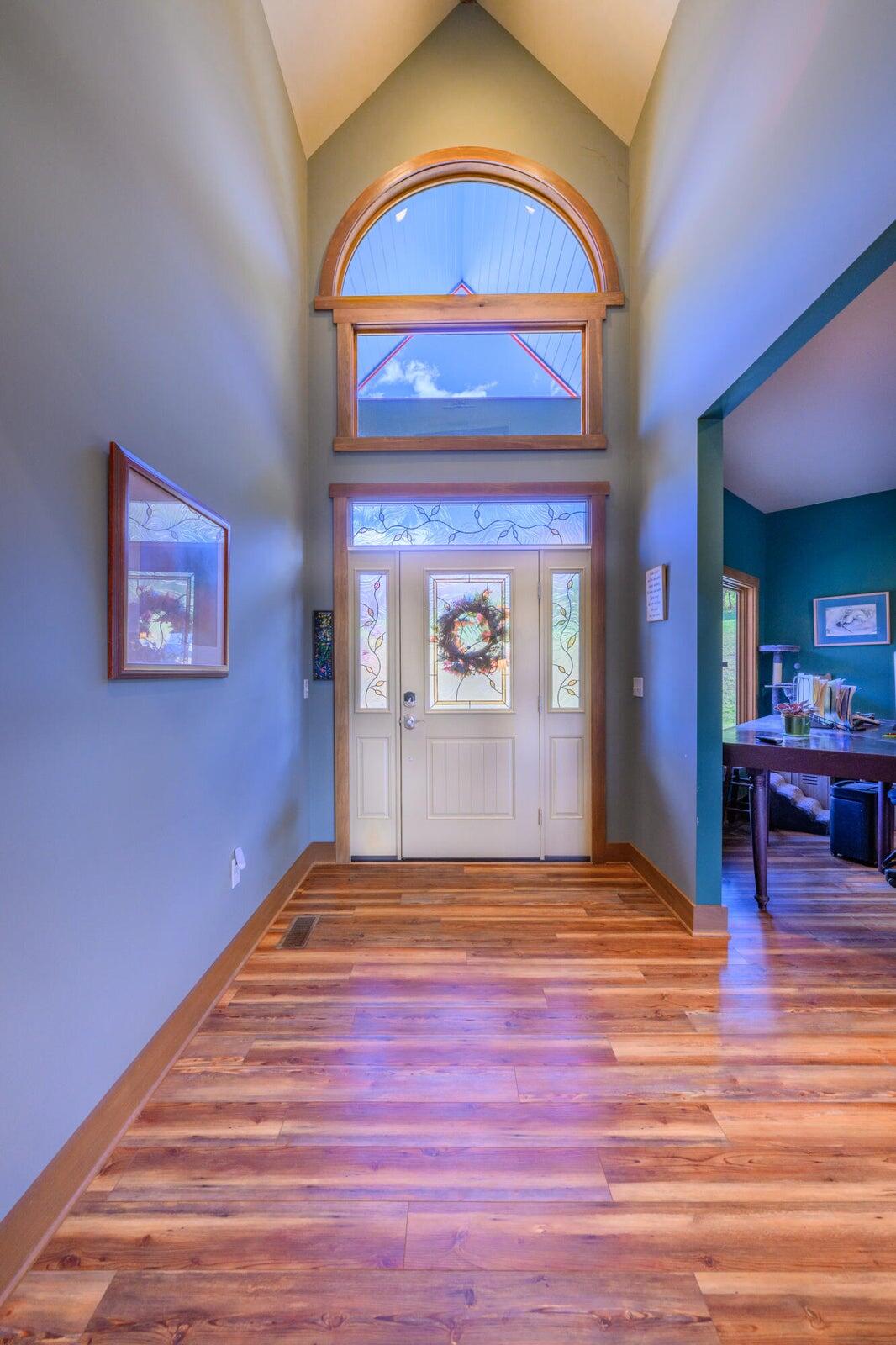 747 New Providence Road Raphine, VA 24472 - Photo 14 of 46 a view of livingroom with kitchen view and wooden floor