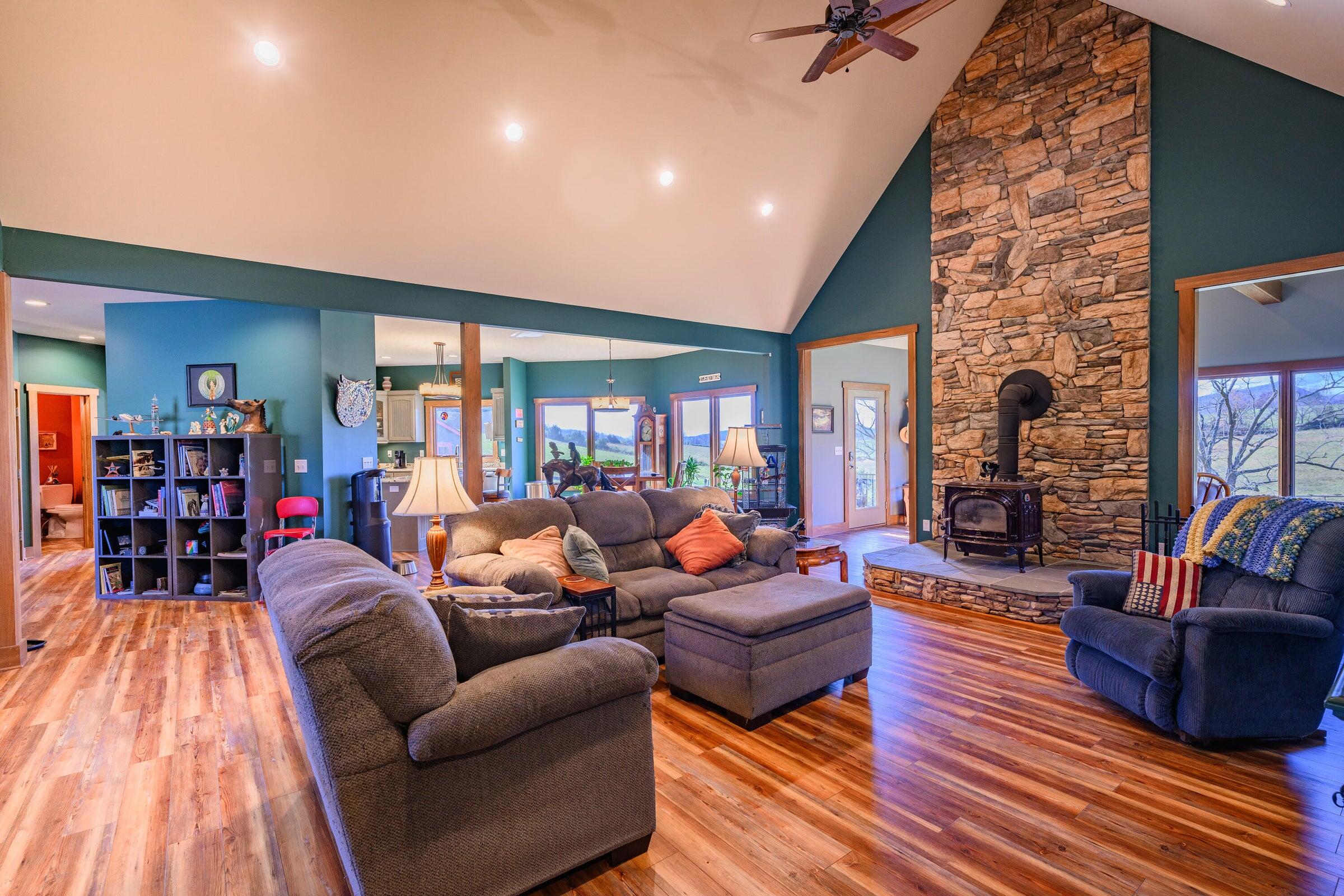747 New Providence Road Raphine, VA 24472 - Photo 16 of 46 a living room with furniture and a wooden floor