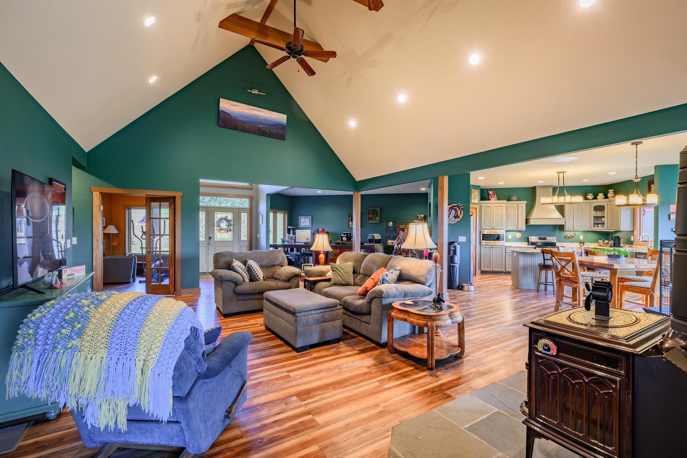 747 New Providence Road Raphine, VA 24472 - Photo 19 of 46 a living room with lots of furniture and kitchen view
