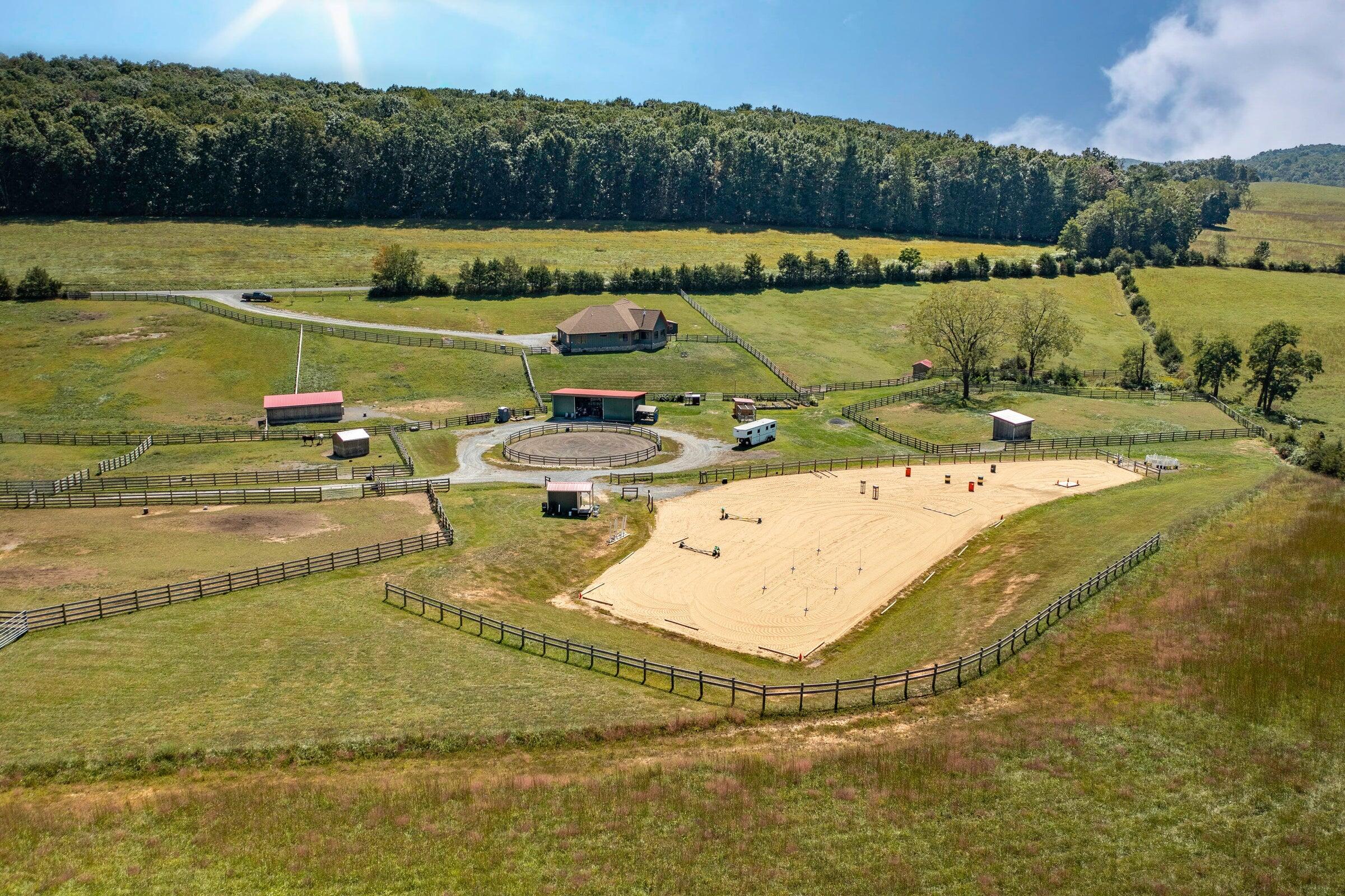 747 New Providence Road Raphine, VA 24472 - Photo 2 of 46 a view of a swimming pool with a yard