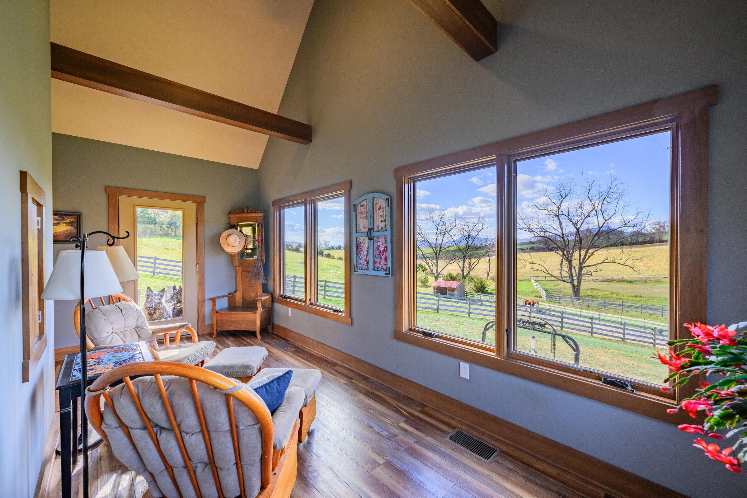 747 New Providence Road Raphine, VA 24472 - Photo 25 of 46 a living room with furniture and a large window