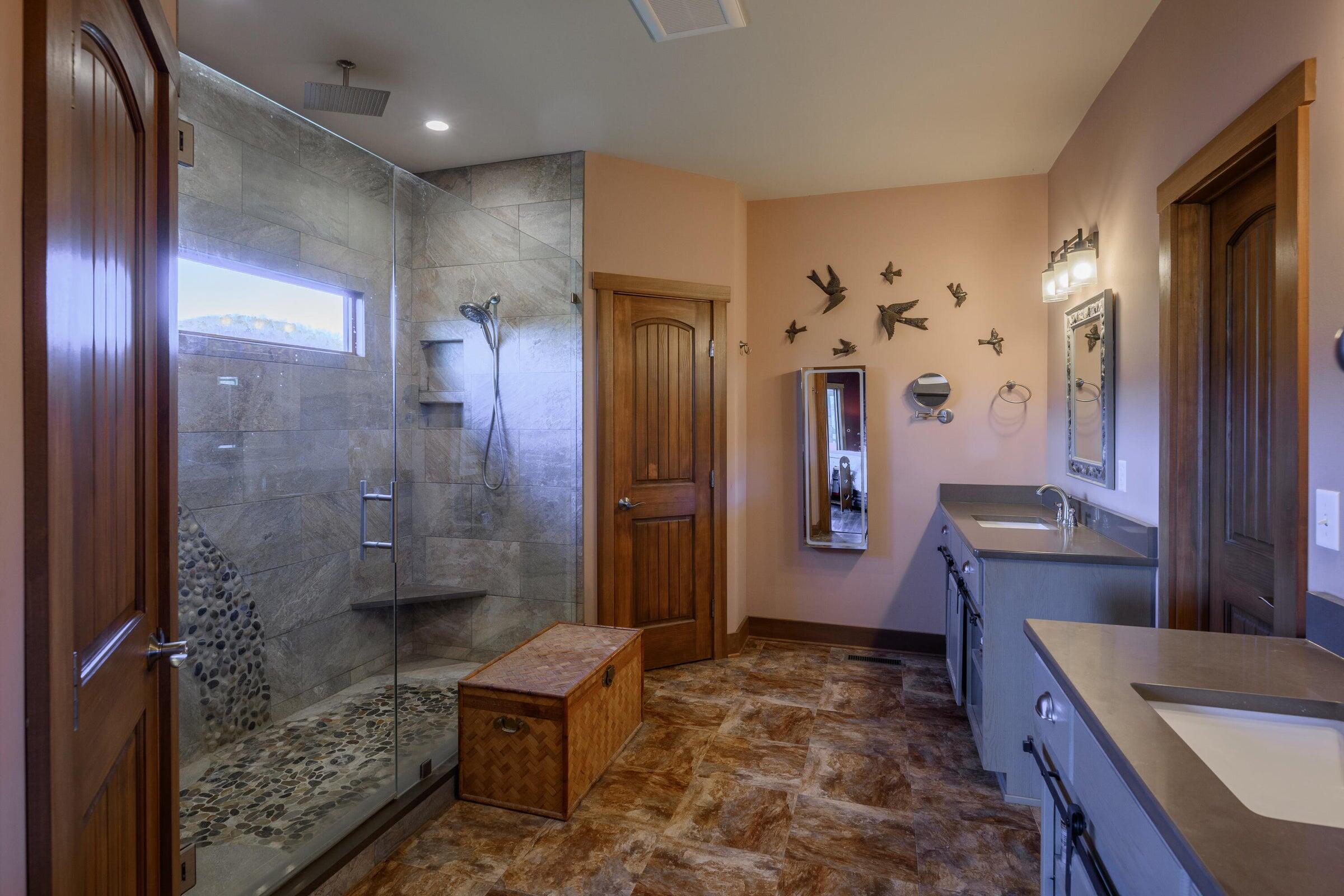 747 New Providence Road Raphine, VA 24472 - Photo 34 of 46 a bathroom with a sink a toilet and shower
