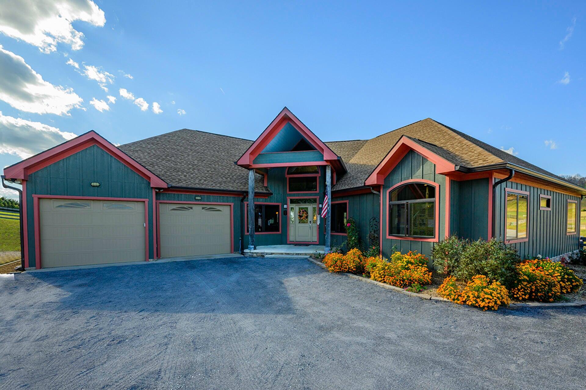 747 New Providence Road Raphine, VA 24472 - Photo 5 of 46 a front view of a house with garden