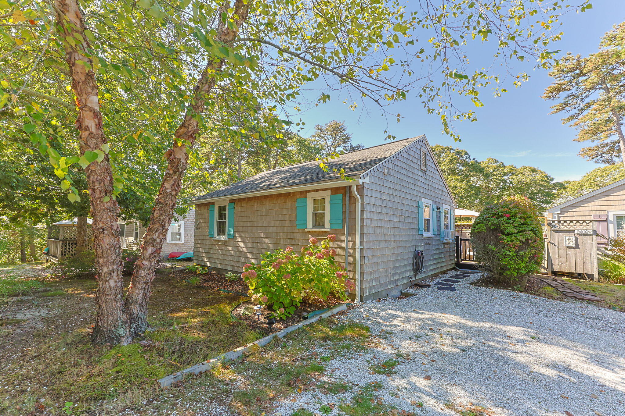 2032 State Hwy Route, Unit F/ (6) Wellfleet, MA 02667 - Photo 5 of 37 front view of a house with a yard