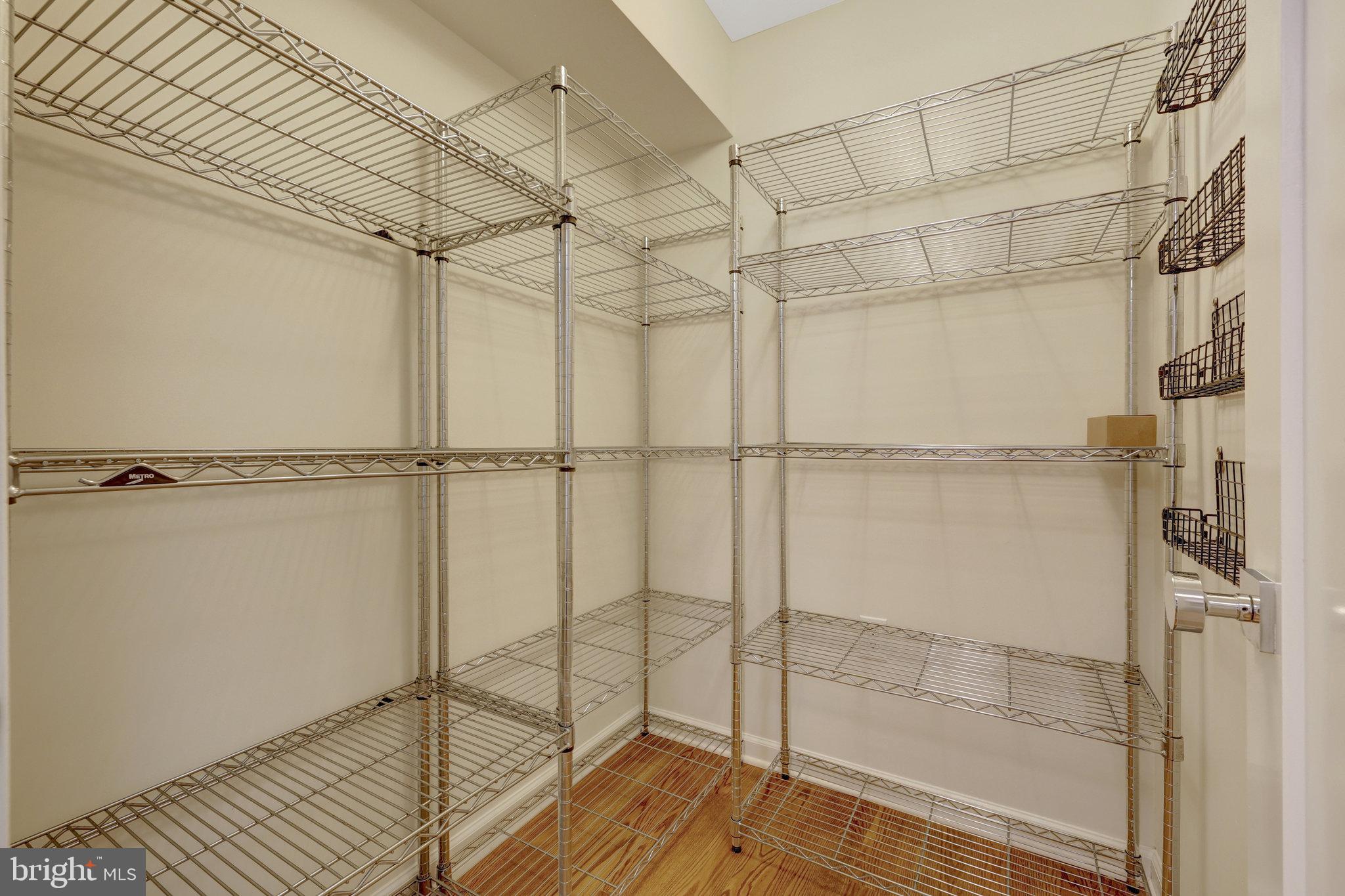 11136 Saffold Way Reston, VA 20190 - Photo 11 of 49 a bathroom with a glass shower door