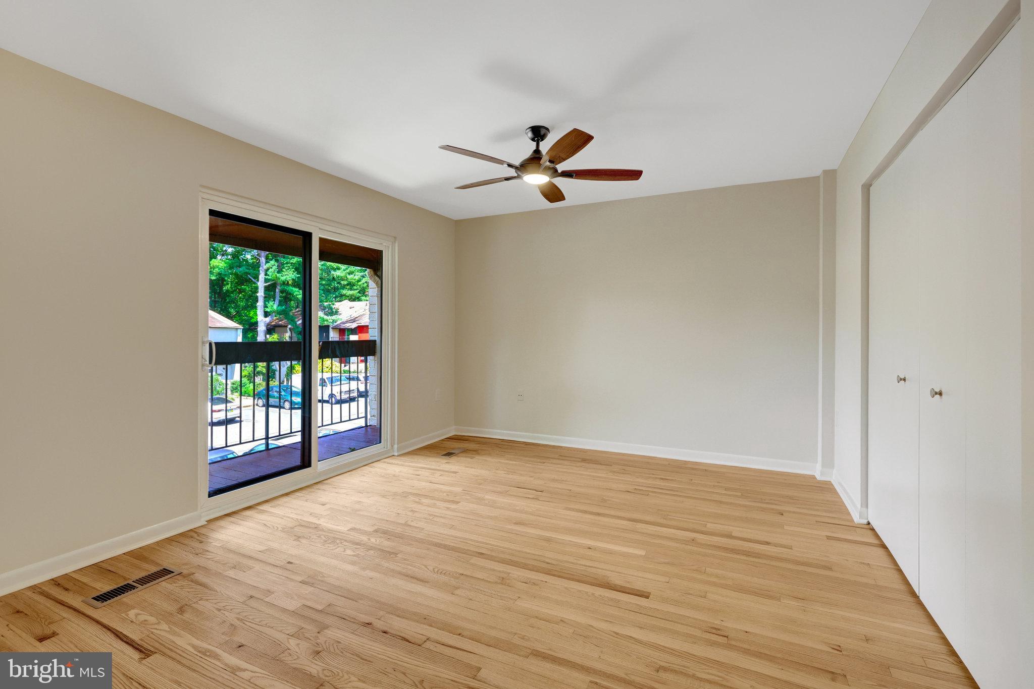 11136 Saffold Way Reston, VA 20190 - Photo 26 of 49 a view of an empty room with a window