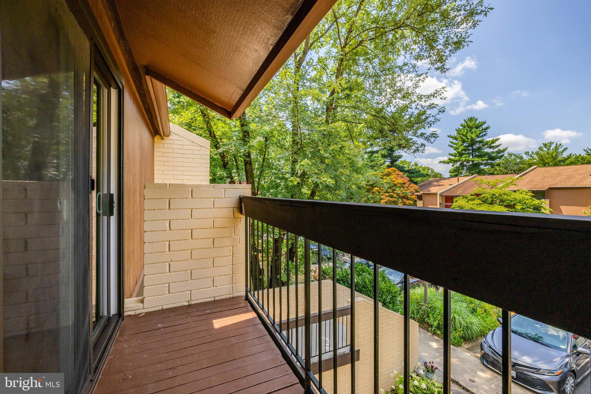 11136 Saffold Way Reston, VA 20190 - Photo 29 of 49 a view of a balcony with wooden floor