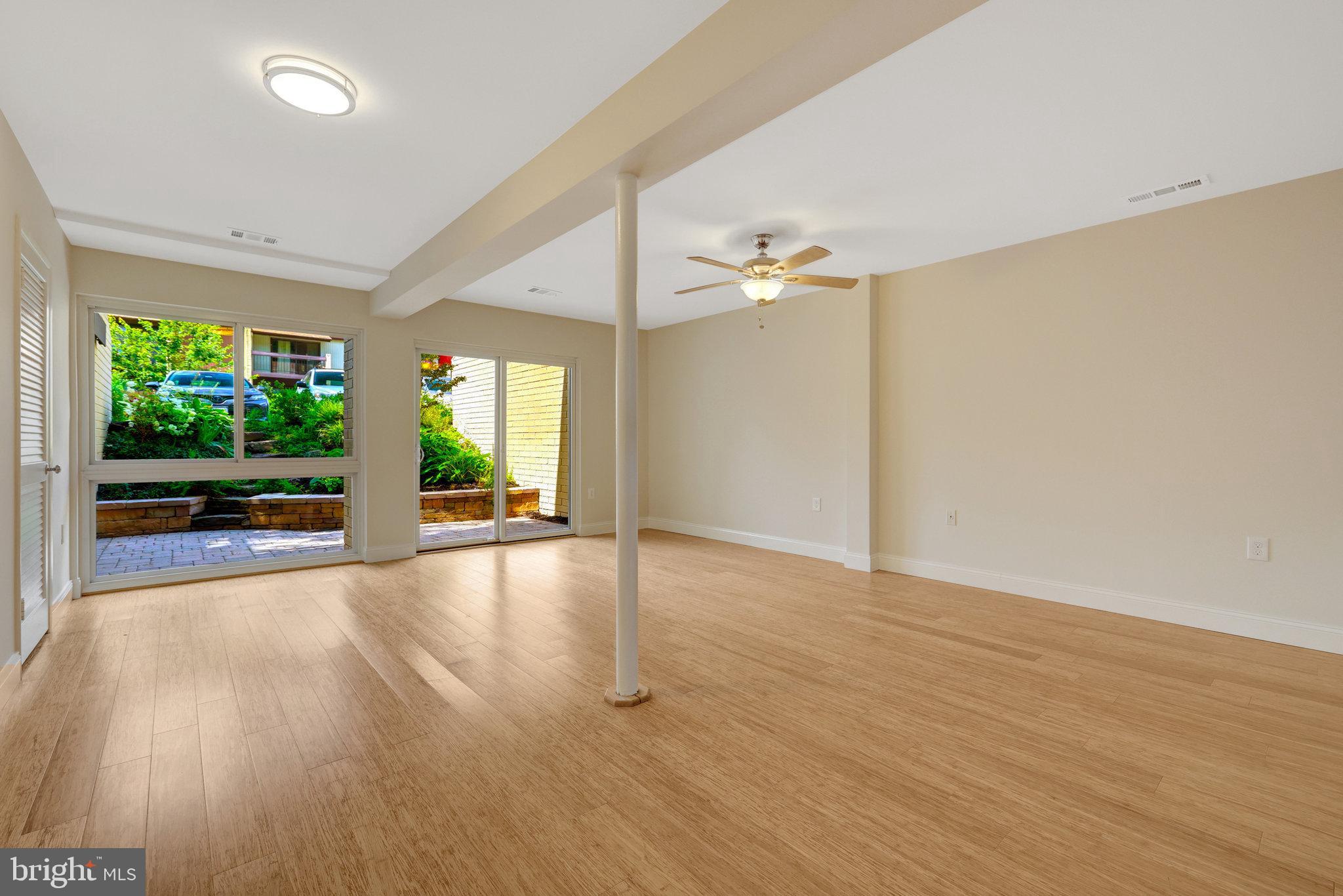 11136 Saffold Way Reston, VA 20190 - Photo 32 of 49 wooden floor in an empty room with a window