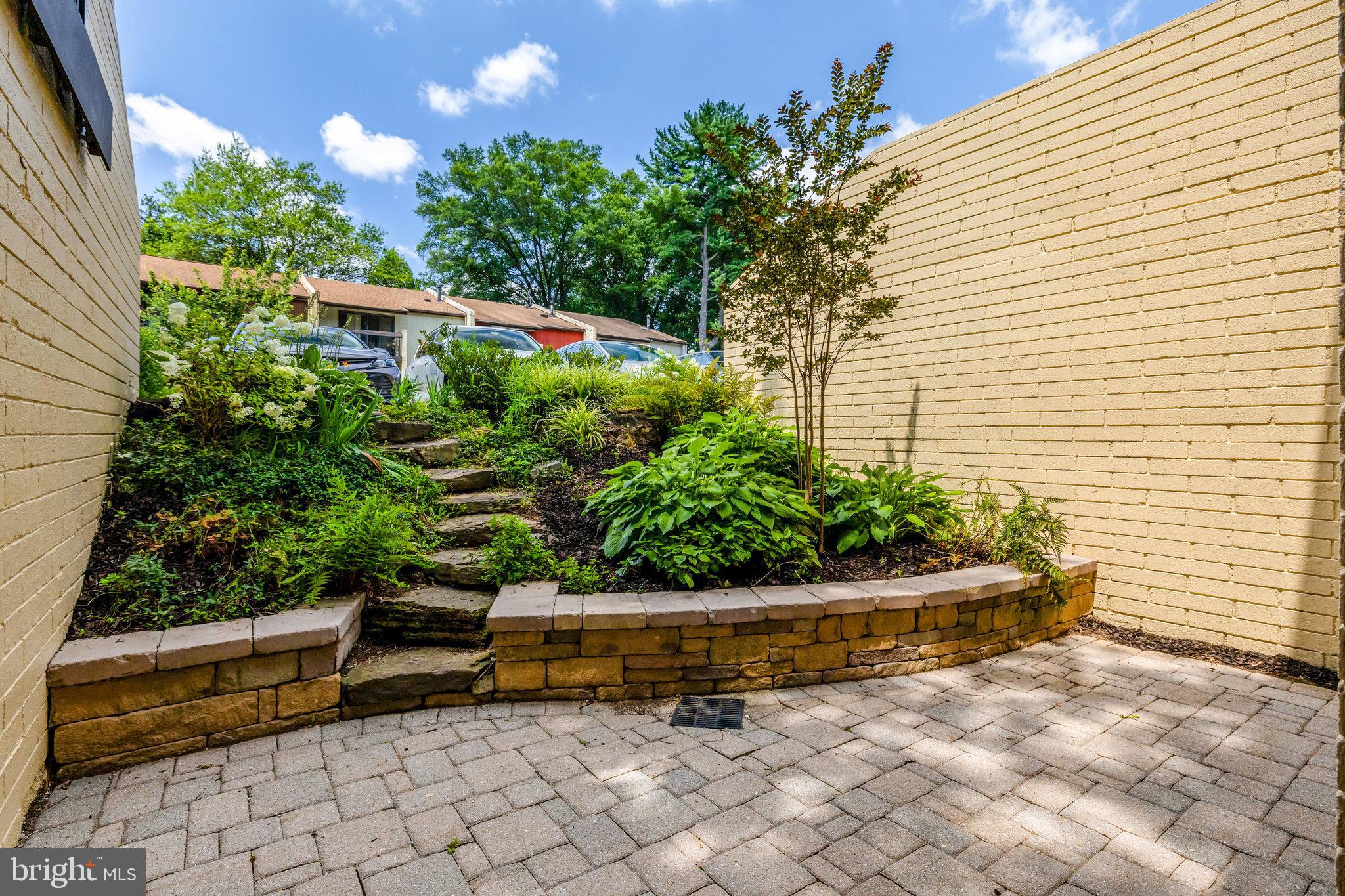 11136 Saffold Way Reston, VA 20190 - Photo 36 of 49 a view of a backyard with sitting area