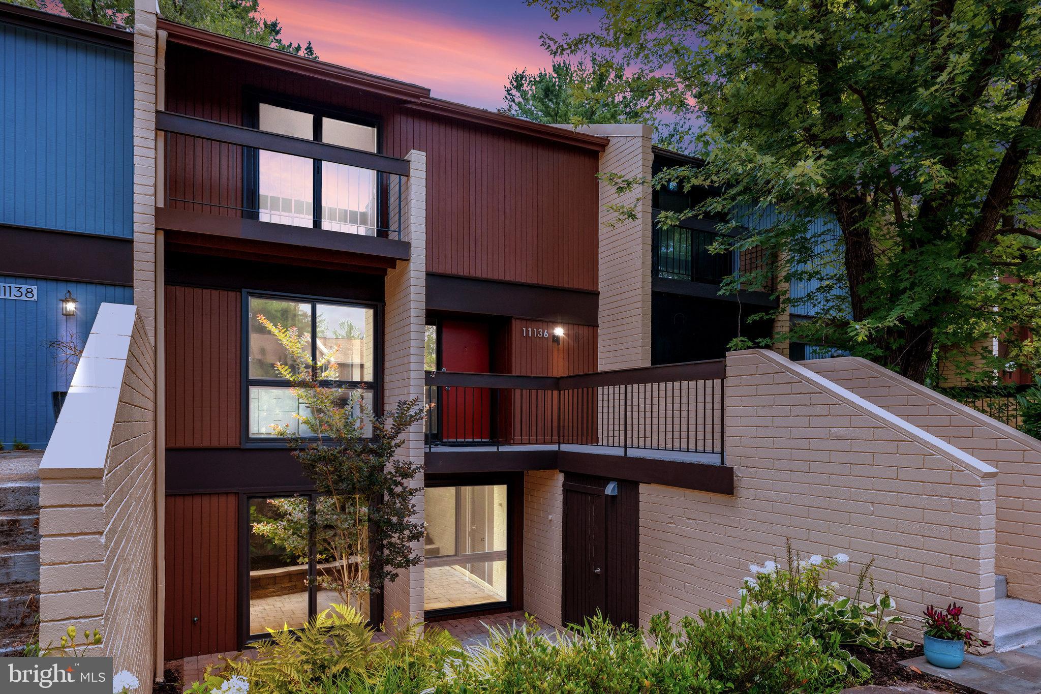 11136 Saffold Way Reston, VA 20190 - Photo 41 of 49 a view of a house with a balcony