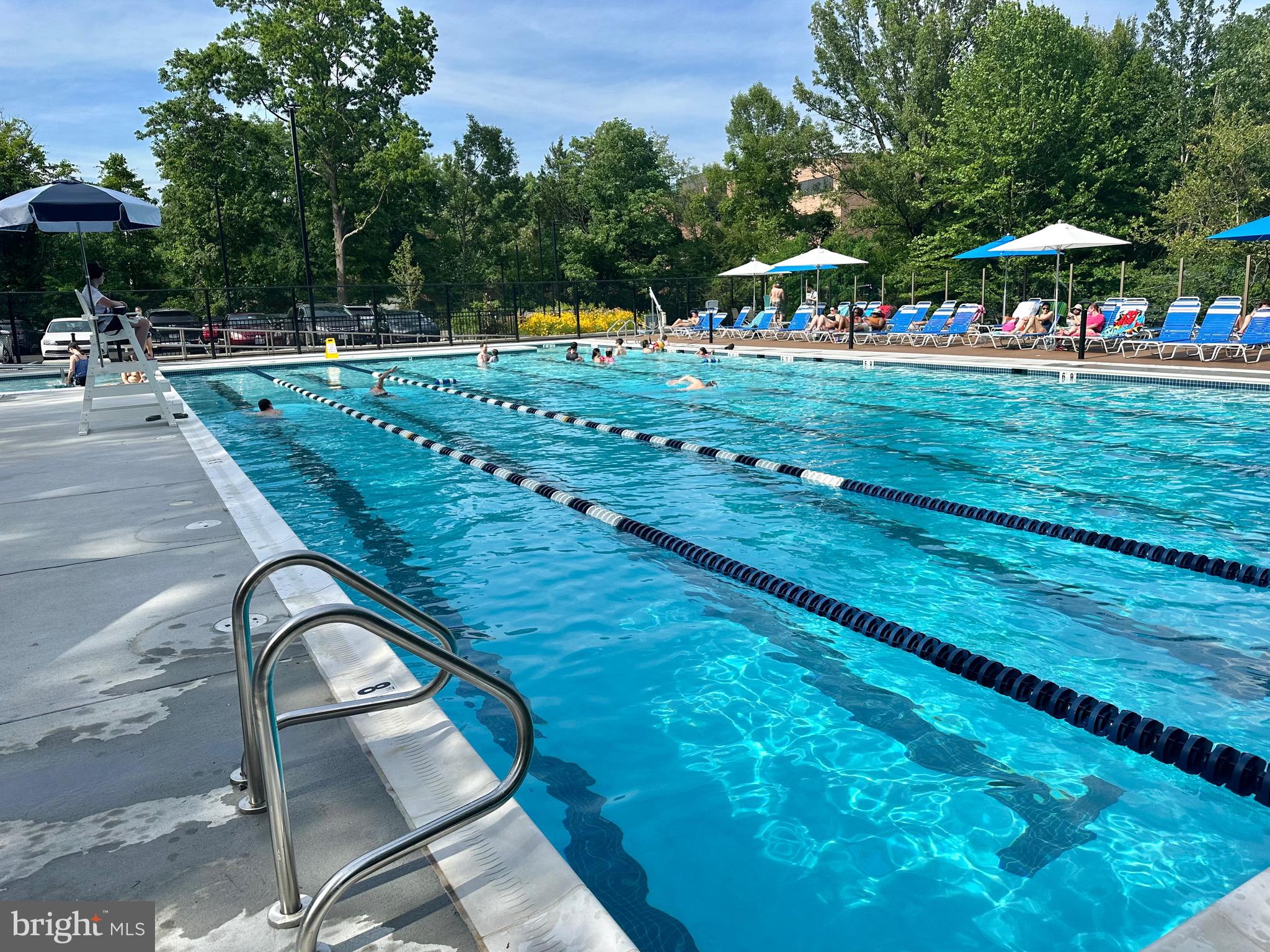 11136 Saffold Way Reston, VA 20190 - Photo 43 of 49 a backyard of a house with table and chairs