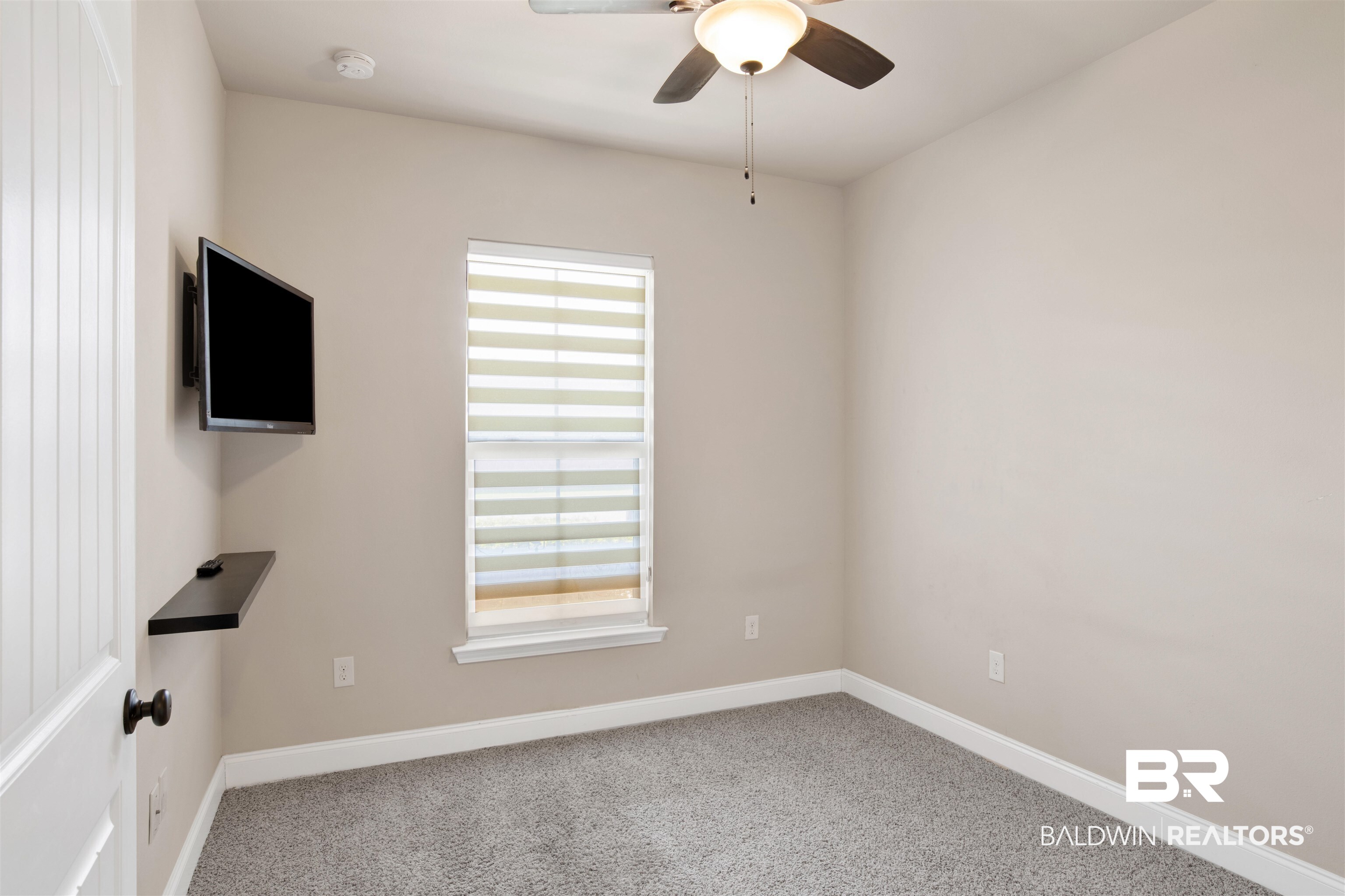 21282 Merlot Loop Silverhill, AL 36576 - Photo 20 of 27 Carpeted spare room with ceiling fan