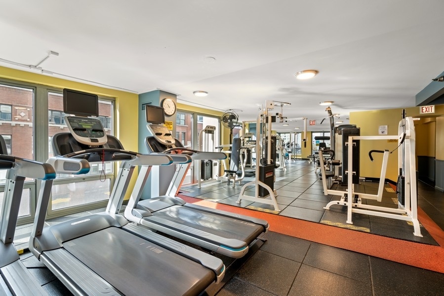 440 North Wabash Avenue, Unit 4706 Chicago, IL 60611 - Photo 27 of 29 a view of a room with gym equipment