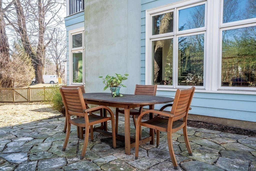 5 Kelveden Road Newton, MA 02468 - Photo 29 of 32 a view of an outdoor dining space with a table and chairs