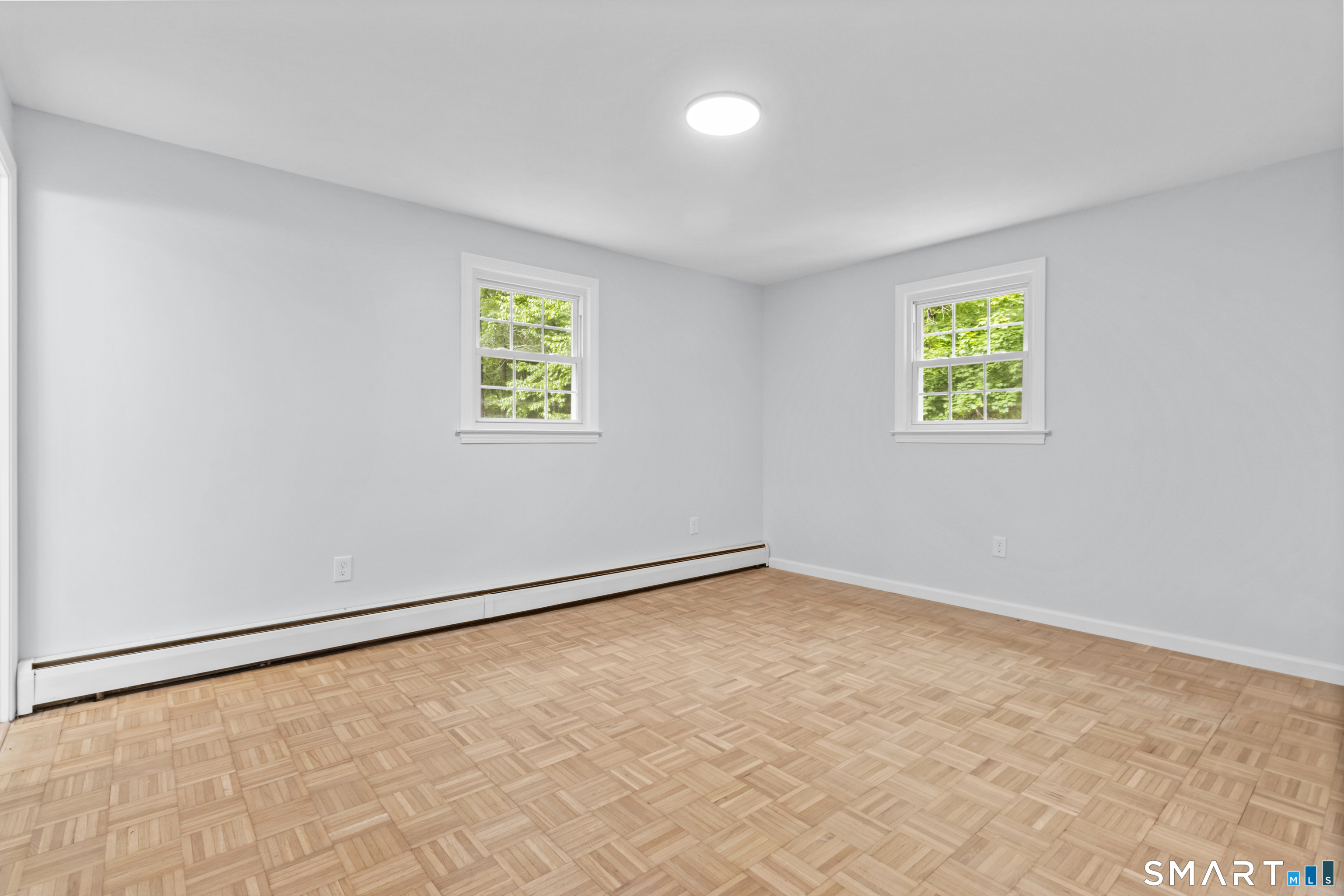 20 Quiet Woods Road East Hampton, CT 06424 - Photo 13 of 40 an empty room with windows