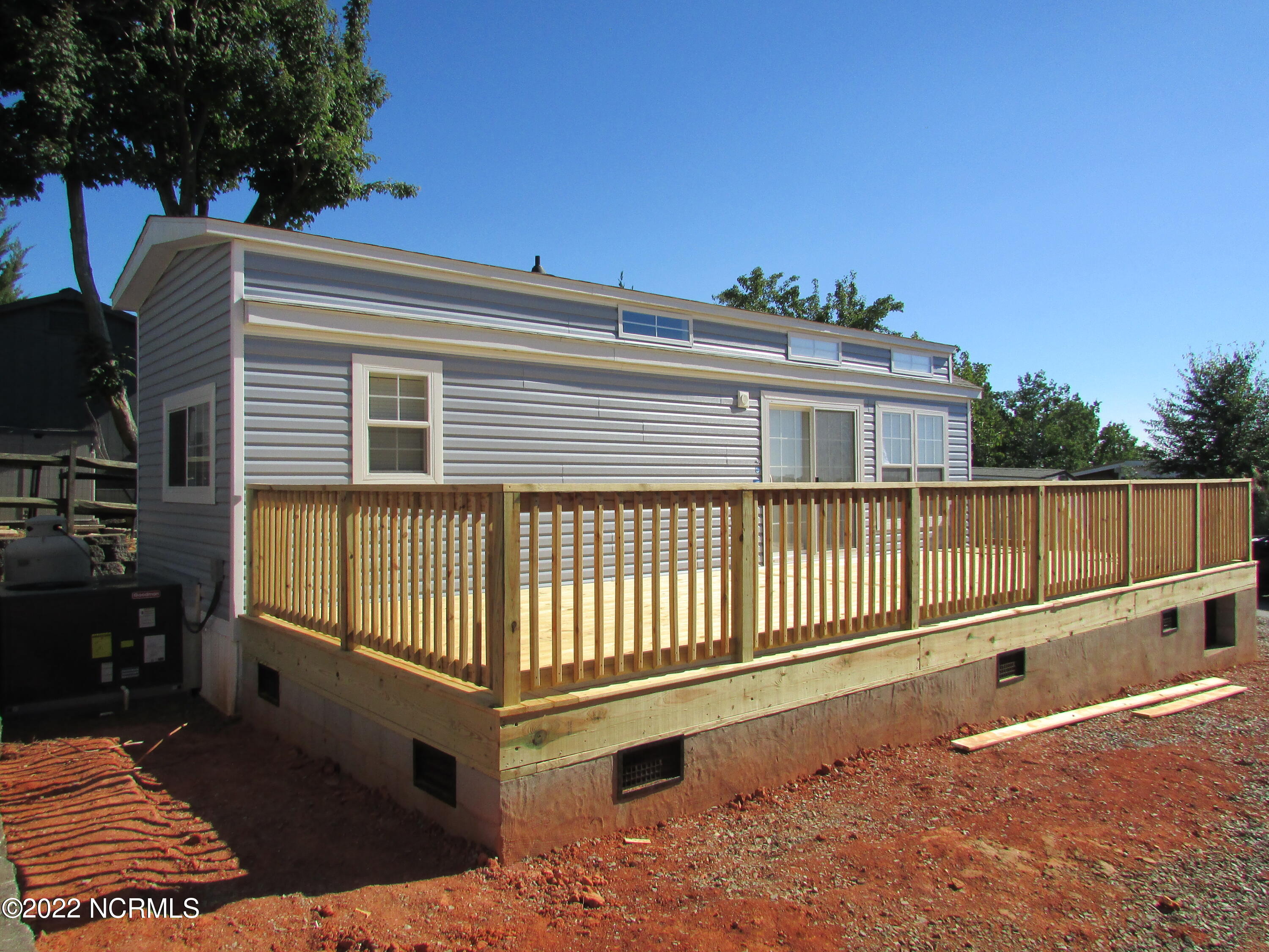213 Baden View Road New London, NC 28127 - Photo 2 of 34 Side View with Deck