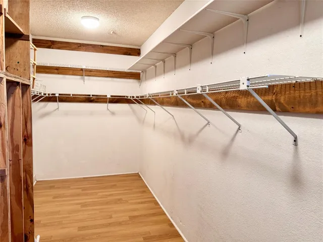a view of a room with racks on the wall
