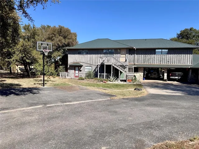a view of a house with a swimming pool