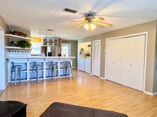 a view of a kitchen with a sink