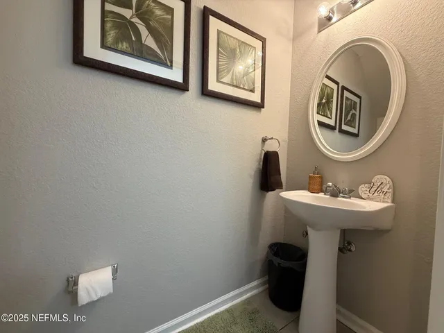 a bed room with a bed and a dresser