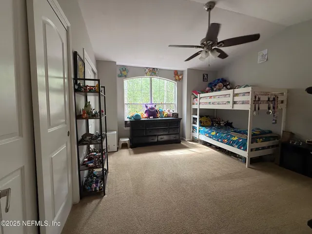 a bathroom with a double vanity sink and mirror