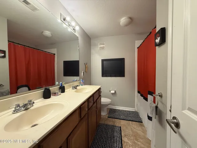 a view of a living room and a window