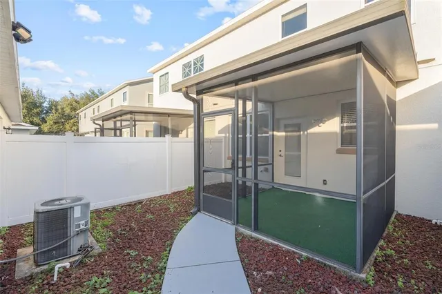 a view of a back yard of the house