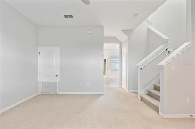 a view of hallway with stairs