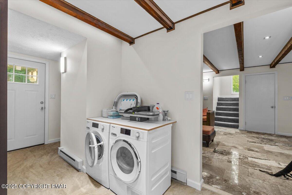 1289 Bear Drive Bushkill, PA 18324 - Photo 22 of 40 a utility room with dryer and washer