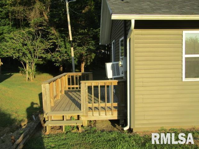 1506 Hillside Road Rosiclare, IL 62982 - Photo 18 of 29 a view of balcony with wooden floor and outdoor seating