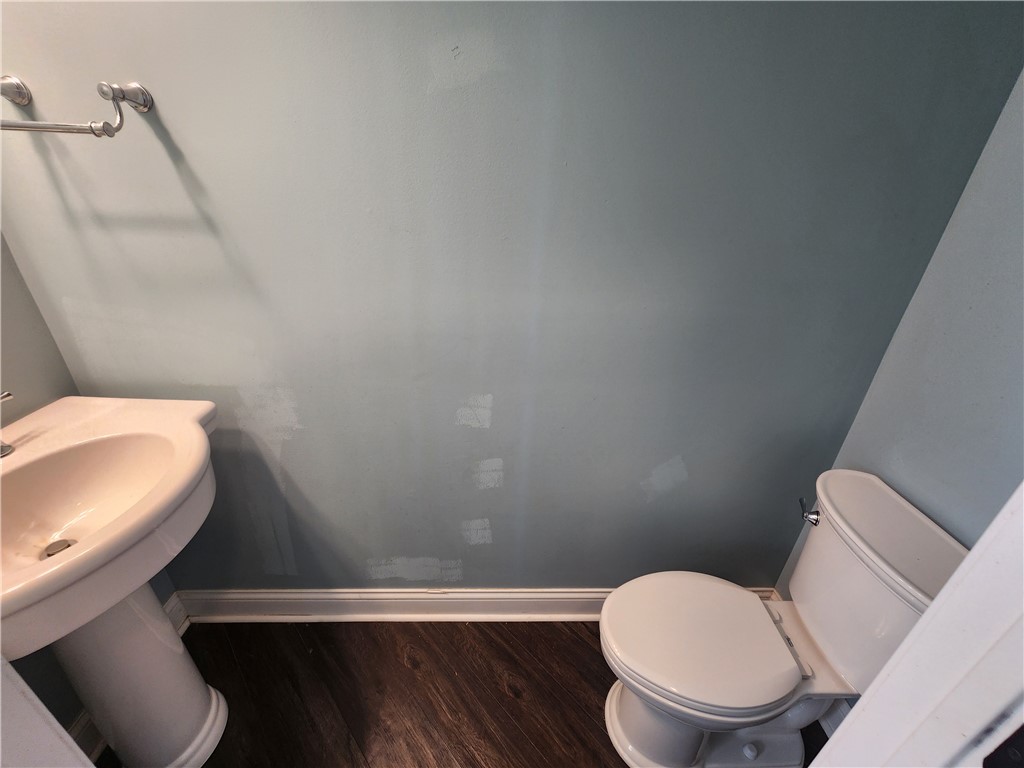7441 Dodson Road Brookville, OH 45309 - Photo 10 of 50 This functional bathroom features a pedestal sink and essential fixtures for comfort and utility.