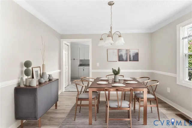 a view of a dining room with furniture