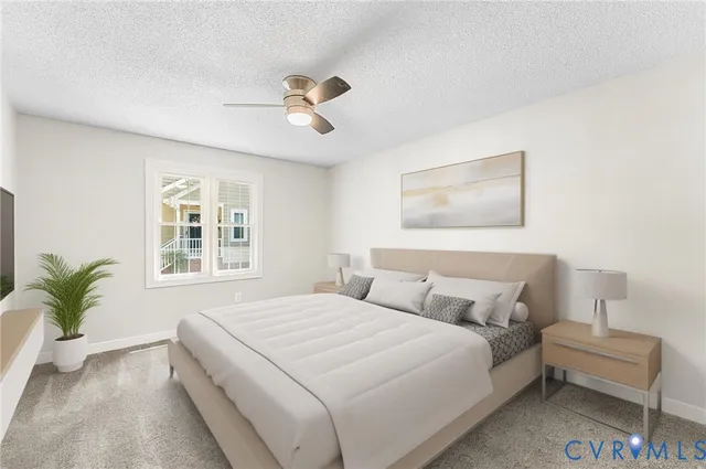 a bedroom with a bed and a couch