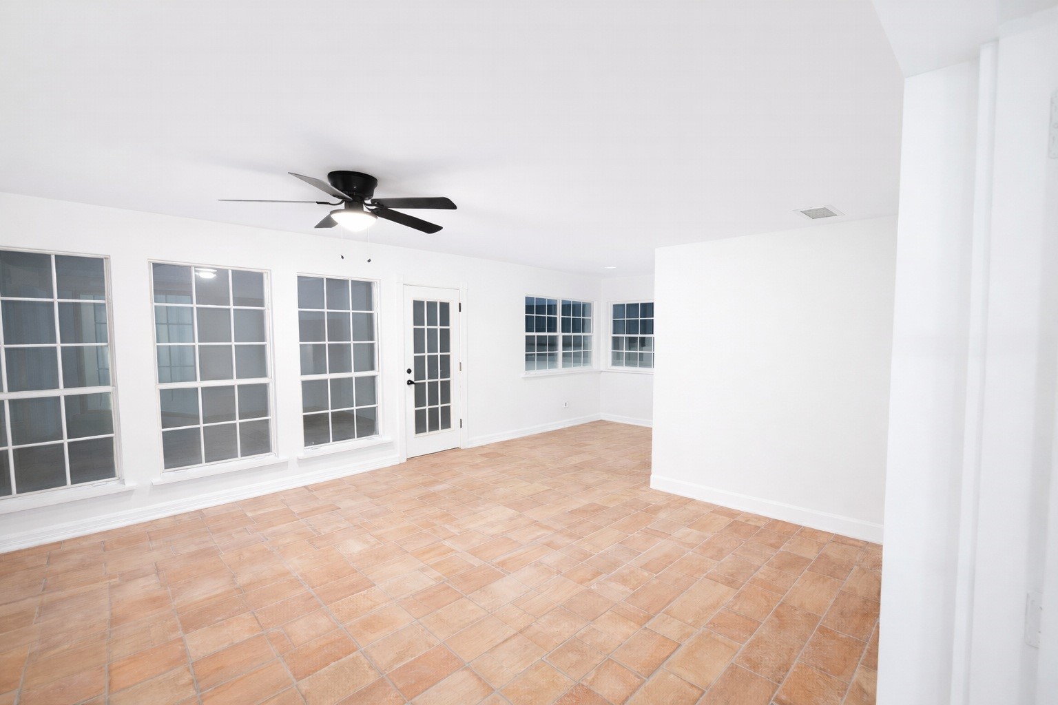 313 Sycamore Street Alvin, TX 77511 - Photo 6 of 12 Space can be used for a game room or work are and or storage.