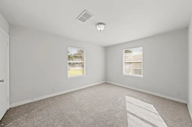 a view of a window in an empty room