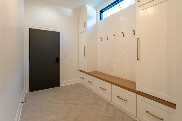 a view of a hallway with closet