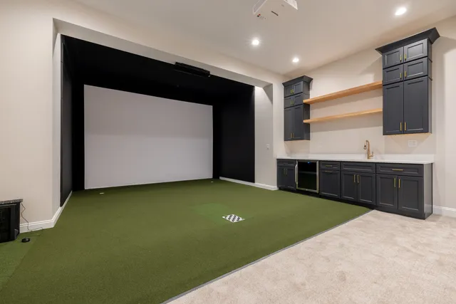 a view of kitchen with sink and cabinets
