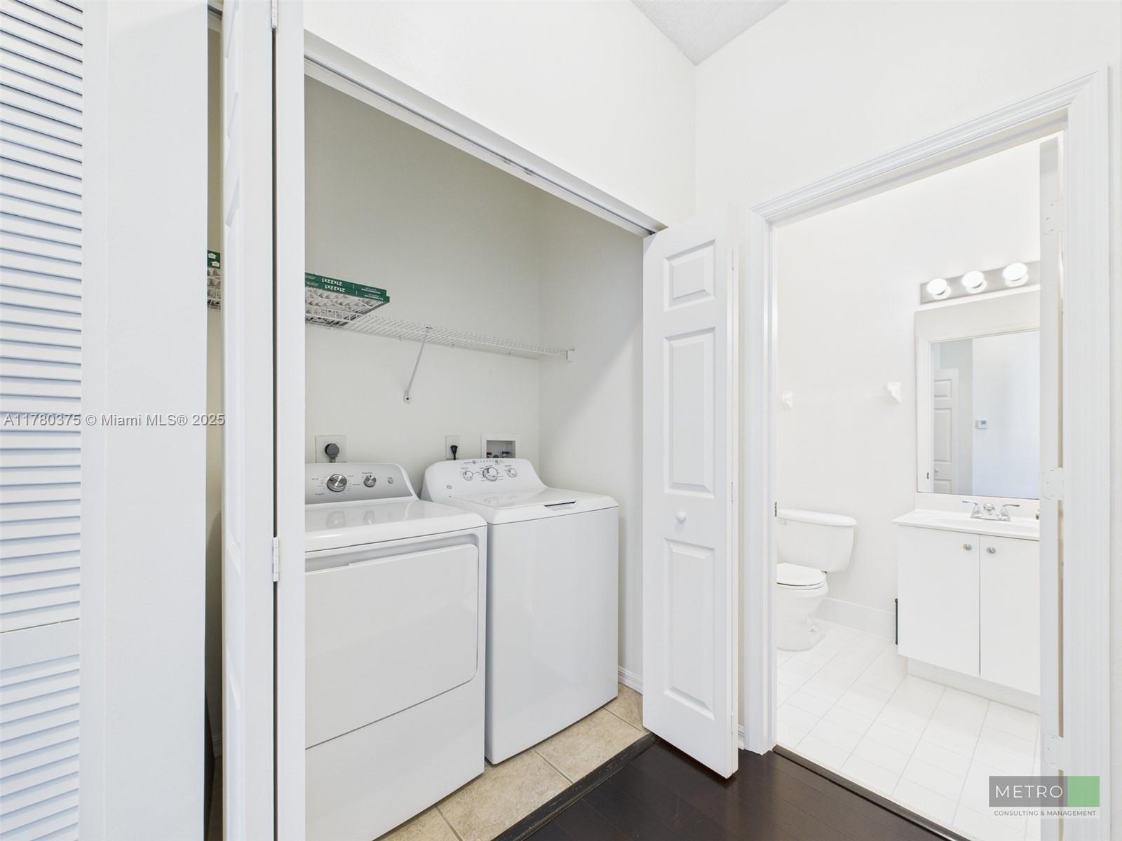 112 Lighthouse Circle, Unit H Tequesta, FL 33469 - Photo 18 of 20 a view of walk in closet with white walls