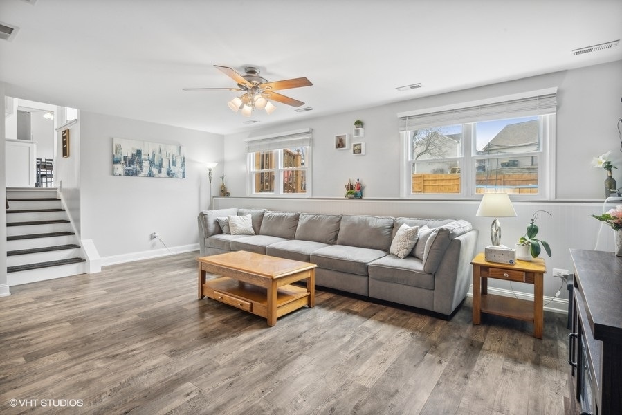 844 Burning Trail Carol Stream, IL 60188 - Photo 17 of 21 a living room with furniture and a large window