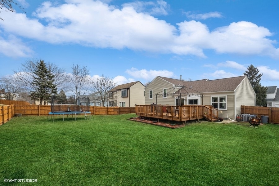 844 Burning Trail Carol Stream, IL 60188 - Photo 21 of 21 a view of a house with a big yard and large trees