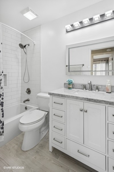 844 Burning Trail Carol Stream, IL 60188 - Photo 9 of 21 a bathroom with a granite countertop toilet sink and mirror