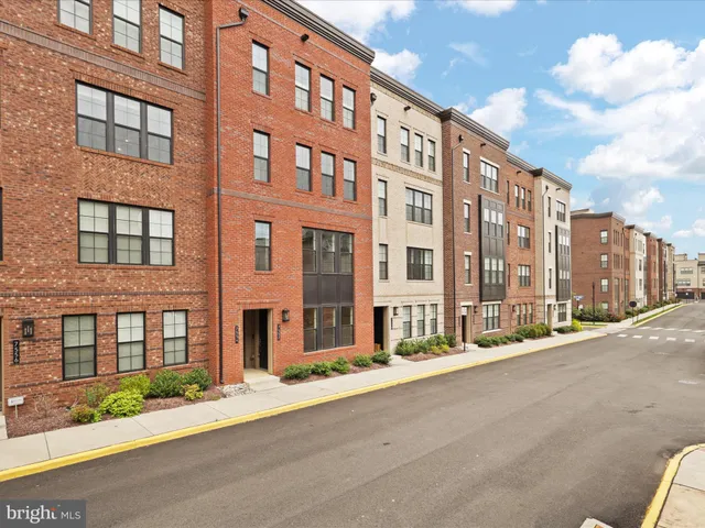 a view of a building with a street