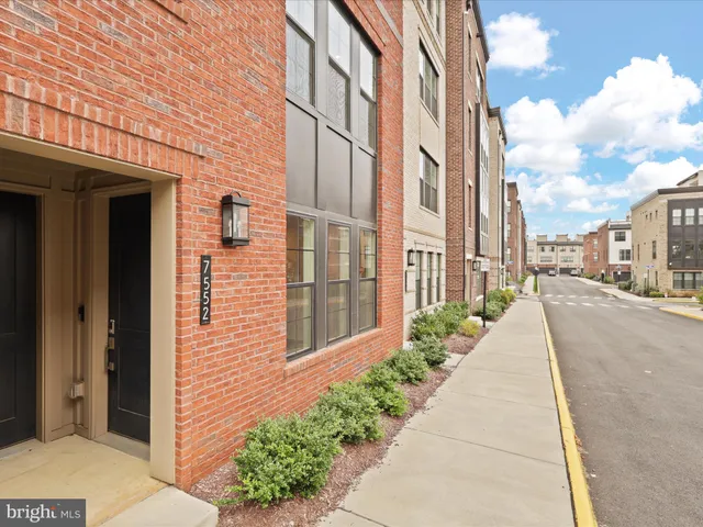 a view of a pathway both side of building