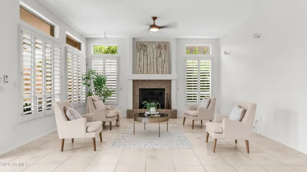 a view of a patio with chairs and tables