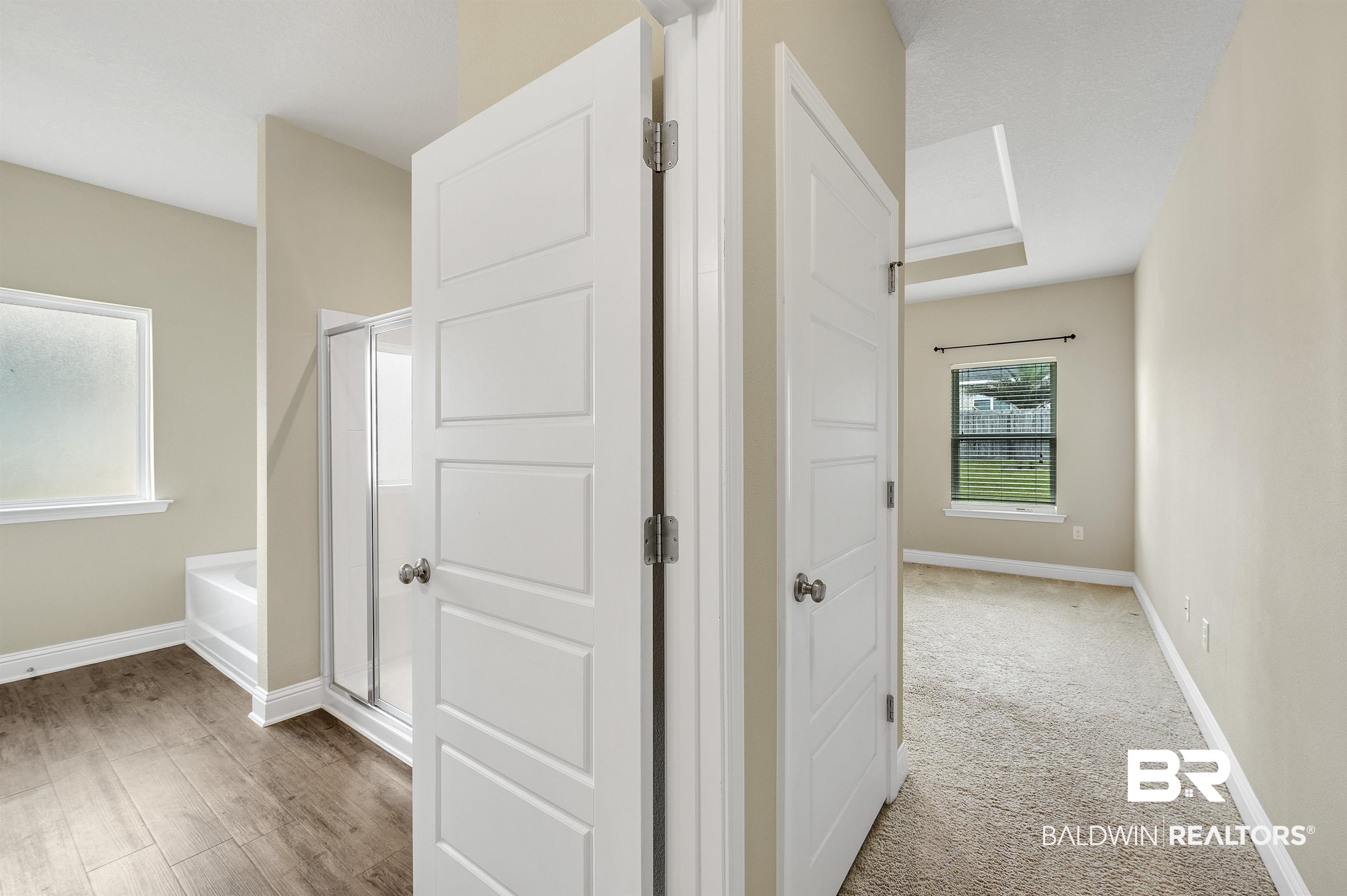 12163 Aurora Way Daphne, AL 36527 - Photo 27 of 46 To Primary Bathroom