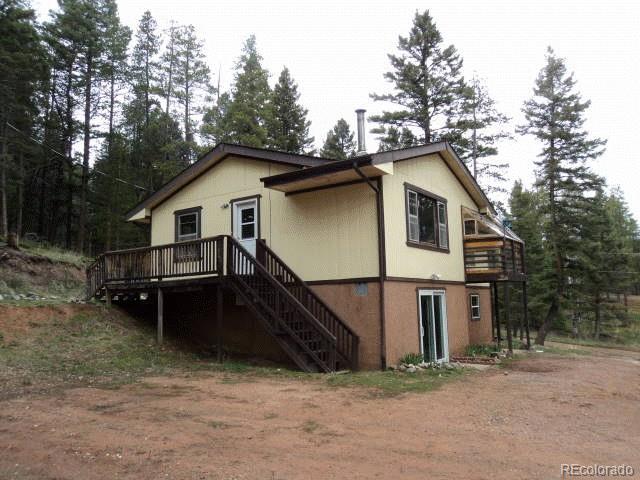 20124 Silver Ranch Road Conifer, CO 80433 - Photo 1 of 1 a house view with a outdoor space