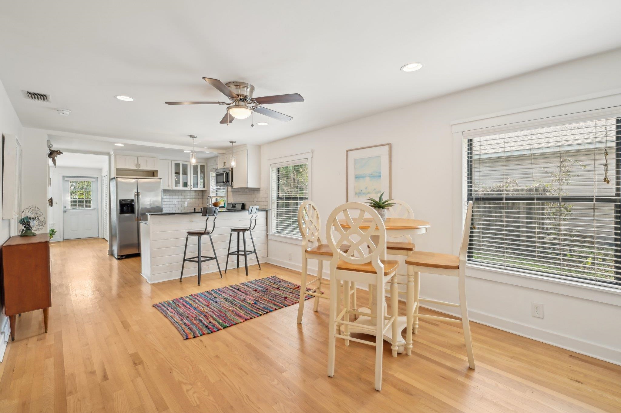7 Atlantic Avenue St. Augustine, FL 32084 - Photo 12 of 38 a living room with furniture and kitchen view