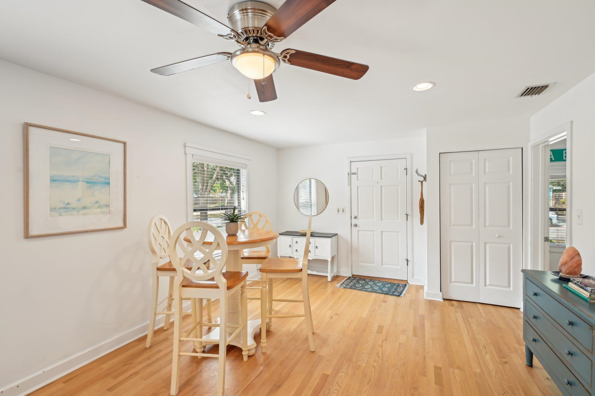 7 Atlantic Avenue St. Augustine, FL 32084 - Photo 13 of 38 a view of a dining room with furniture window and wooden floor