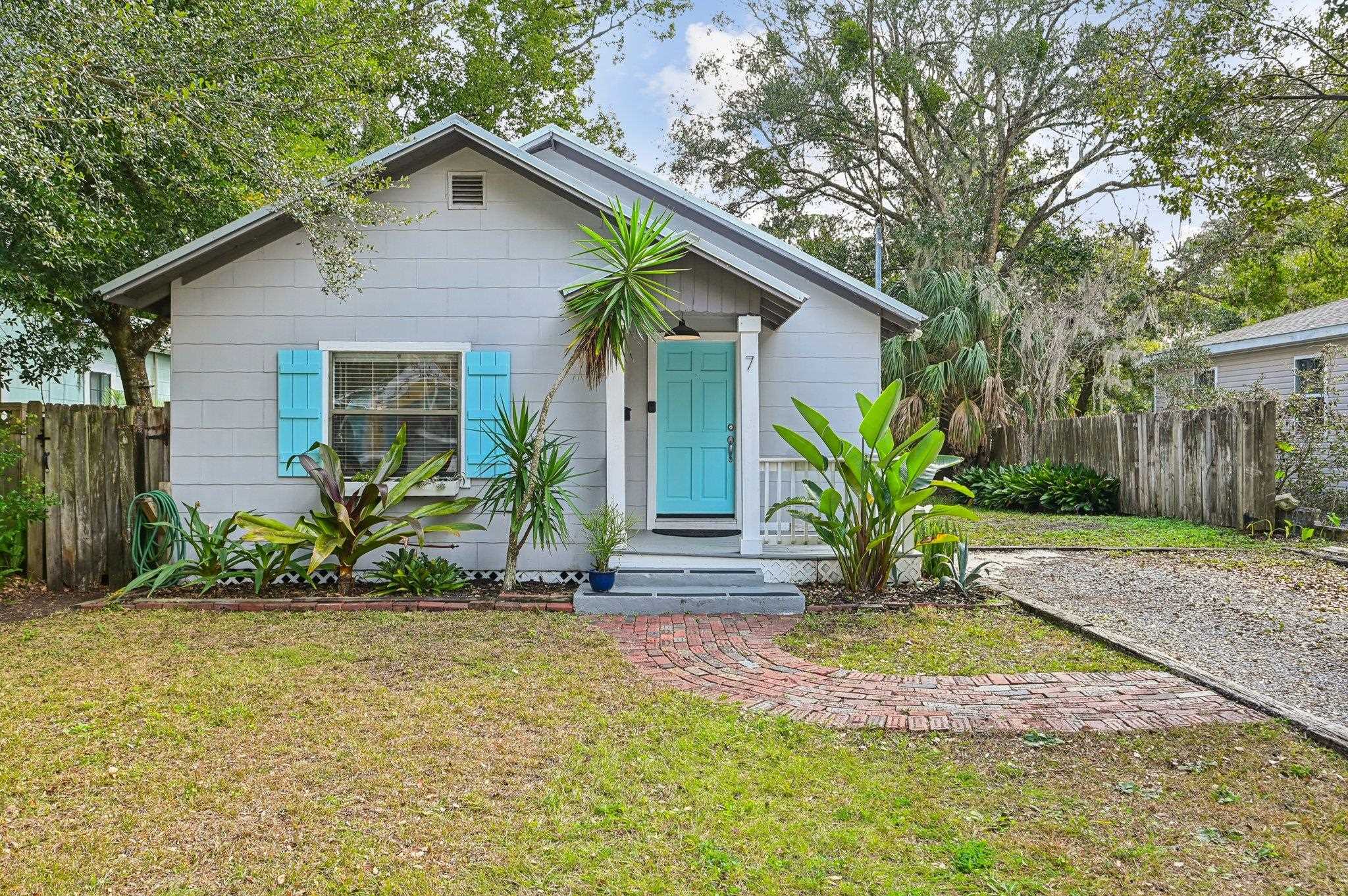 7 Atlantic Avenue St. Augustine, FL 32084 - Photo 2 of 38 a front view of house with yard and green space